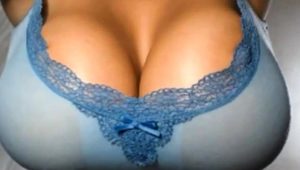  Milf shaking her huge tits on cam
