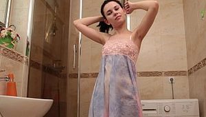  Natural tits babe fingering herself in the shower