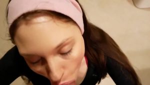  Beautiful girl sucks him off in gym bathroom