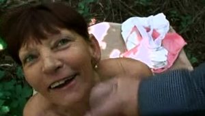  Slutty amateur granny feeds her desire for cock in the woods