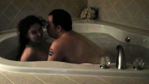  Horny brunette wife feeds her desire for cock in the hot tub